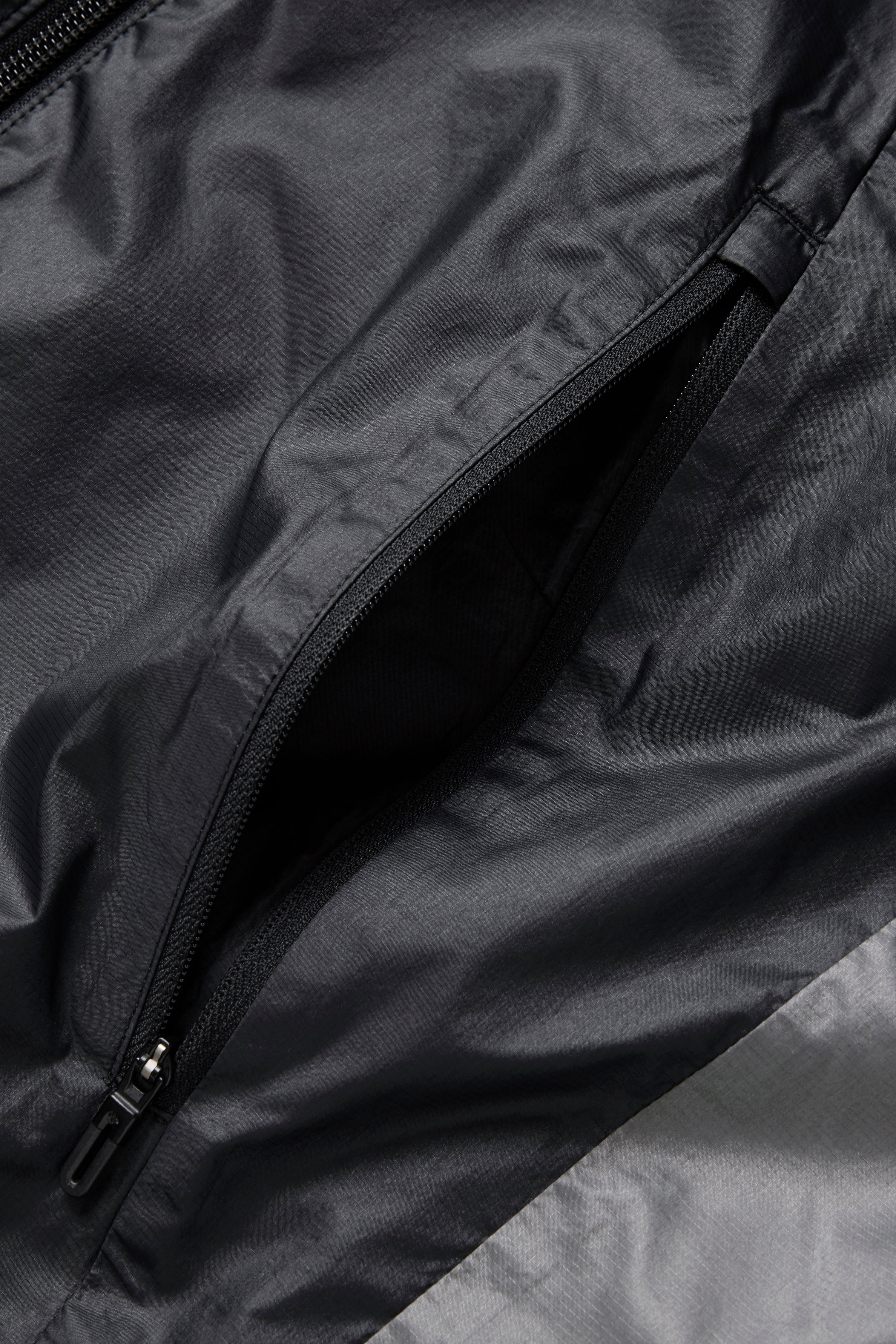 JJJJound Descente Reversible Vest - Black/Charcoal
