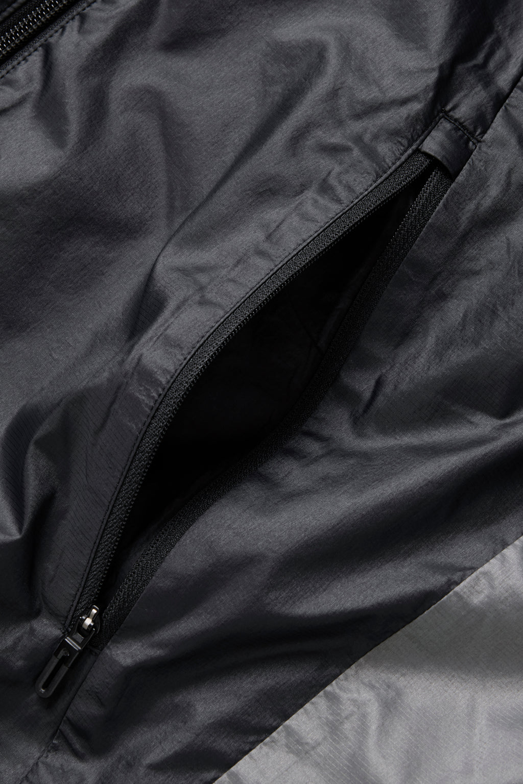 JJJJound Descente Reversible Vest - Black/Charcoal