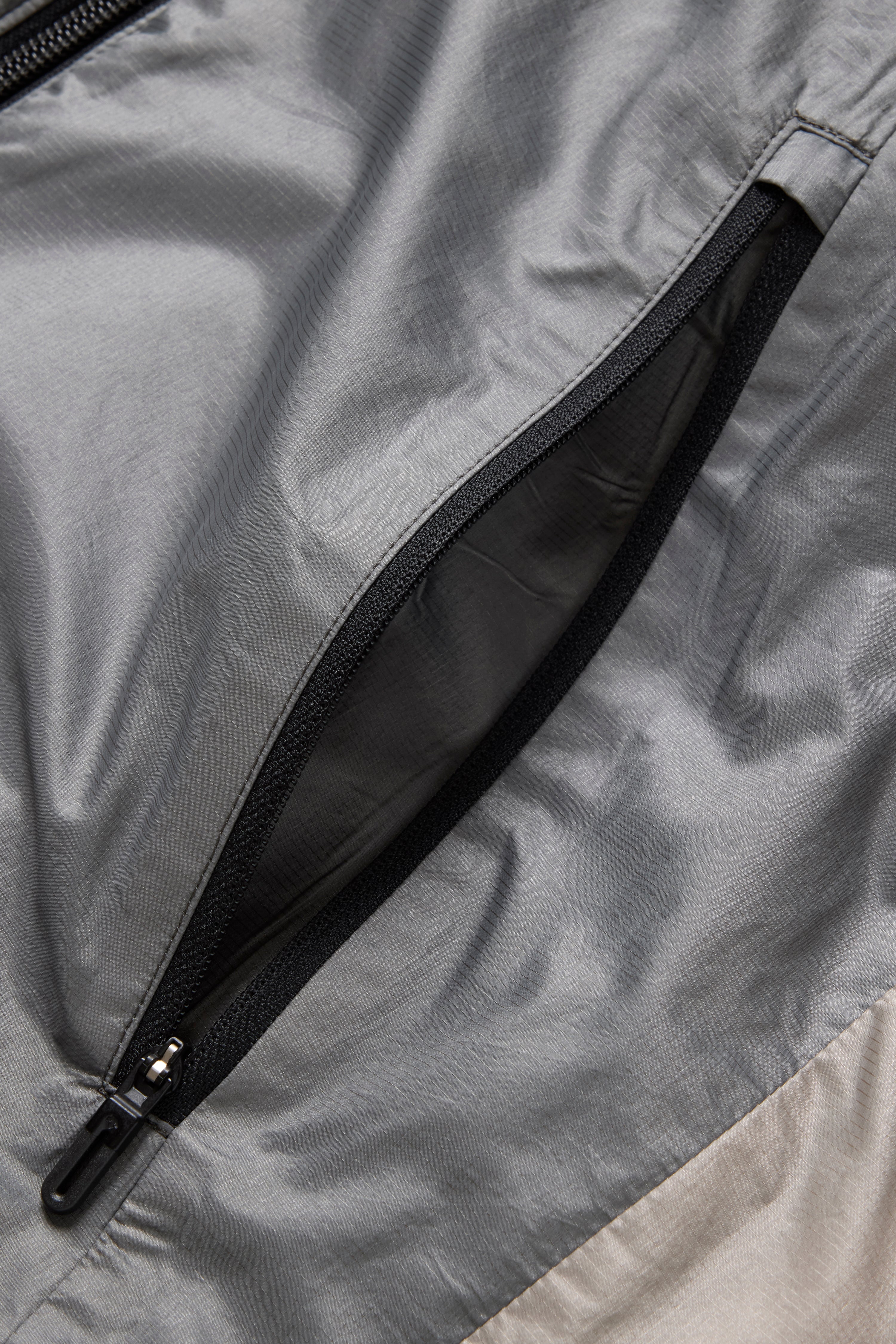 JJJJound Descente Reversible Vest - Charcoal/Taupe
