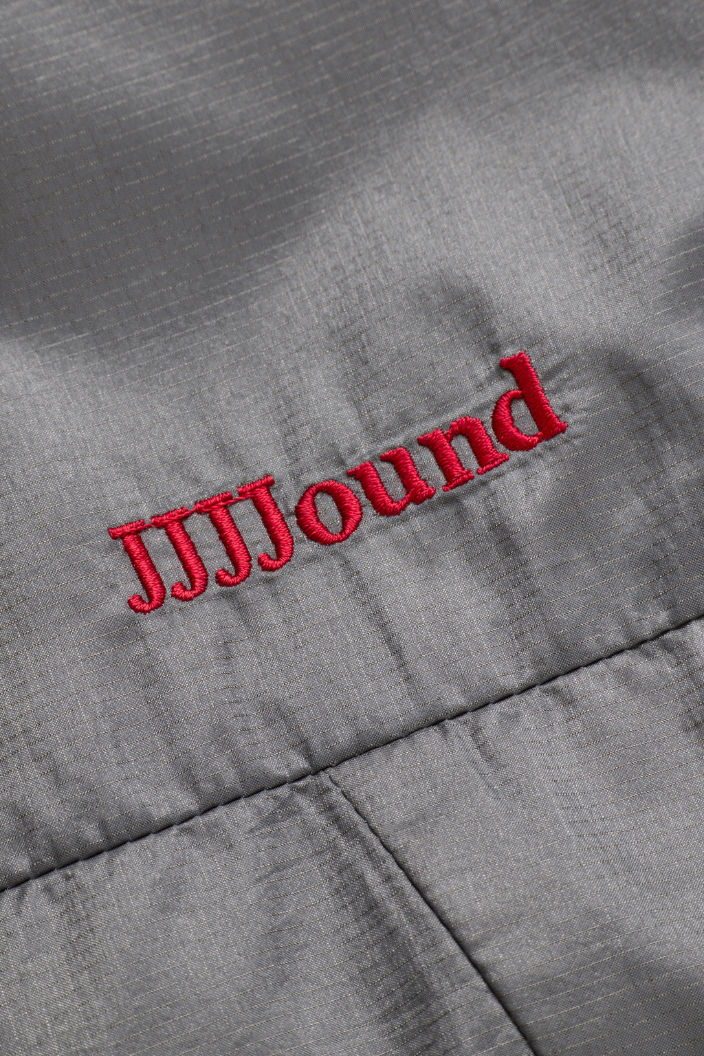 JJJJound Descente Reversible Vest - Charcoal/Taupe