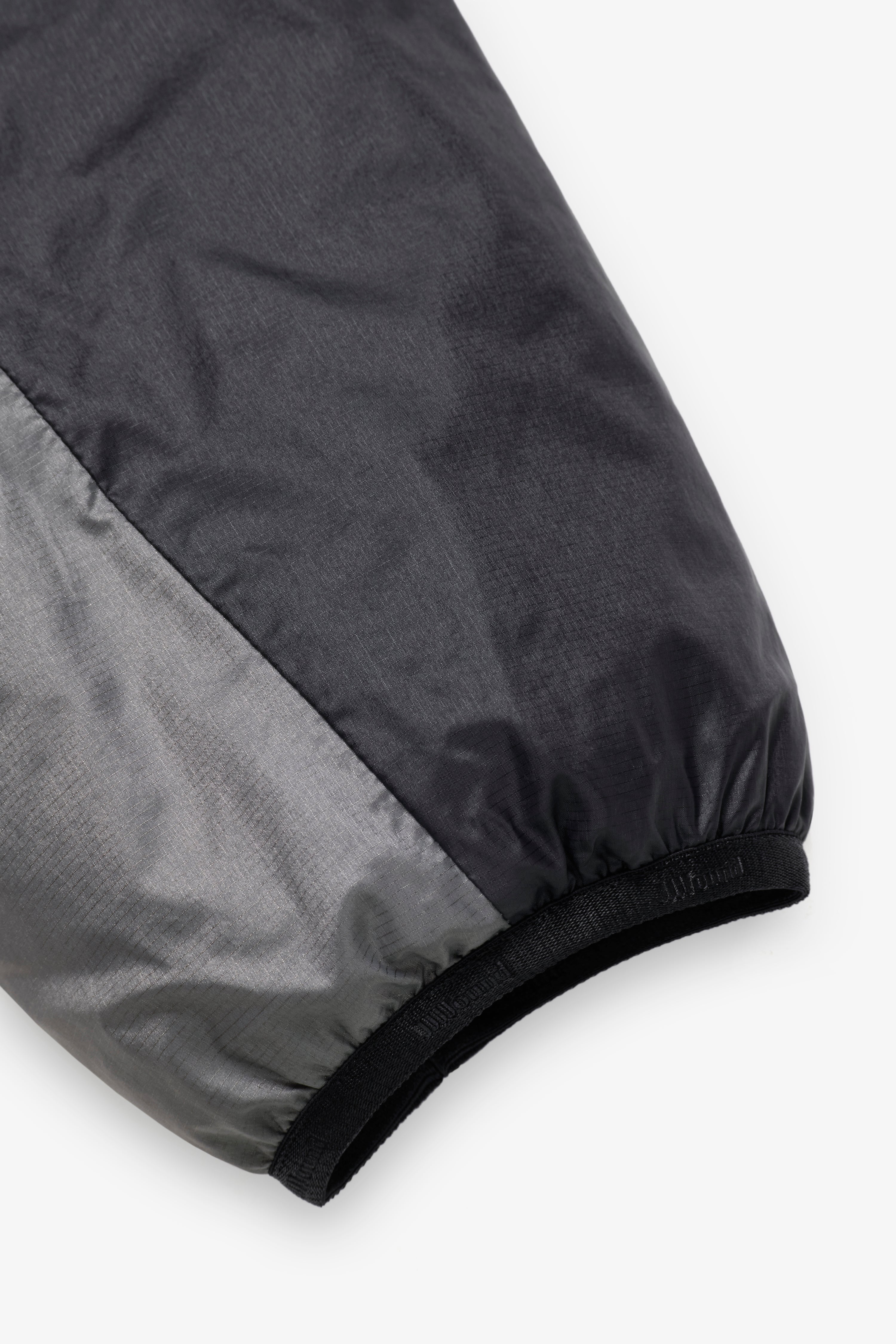 JJJJound Descente Reversible Jacket - Black/Charcoal