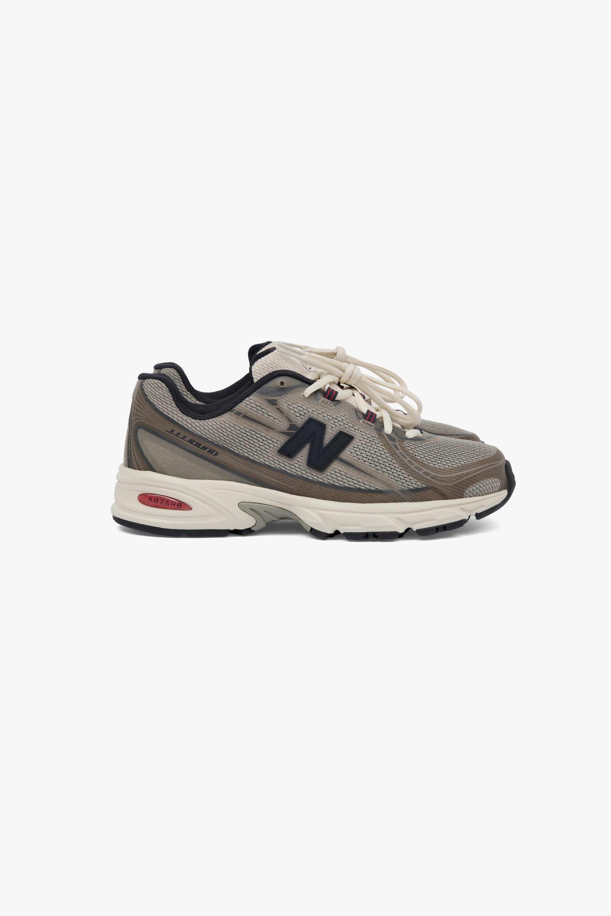 JJJJound x New Balance 740N Taupe lateral view showing angular no-sew overlays and JJJJound 740 logo
